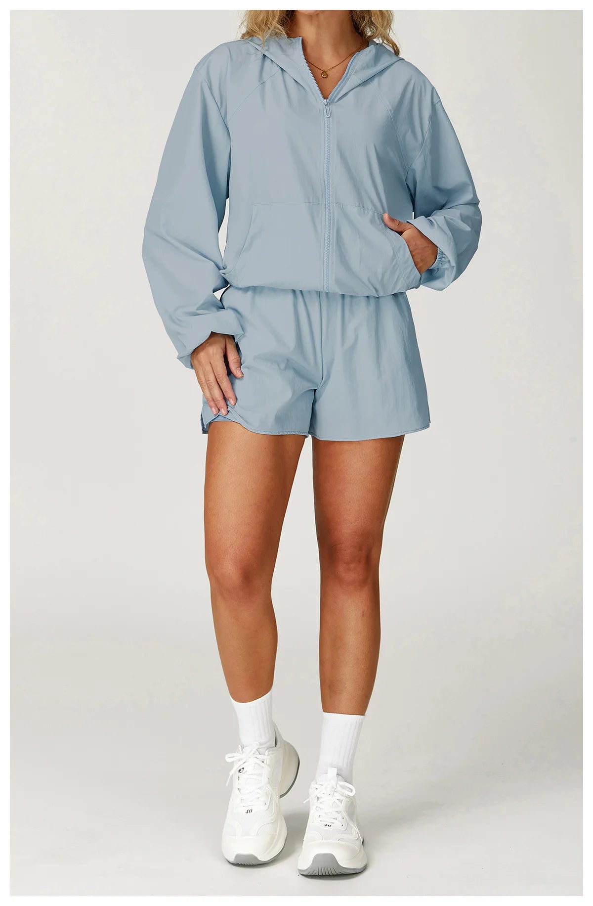 Long sleeved zipper front pocket sports jacket