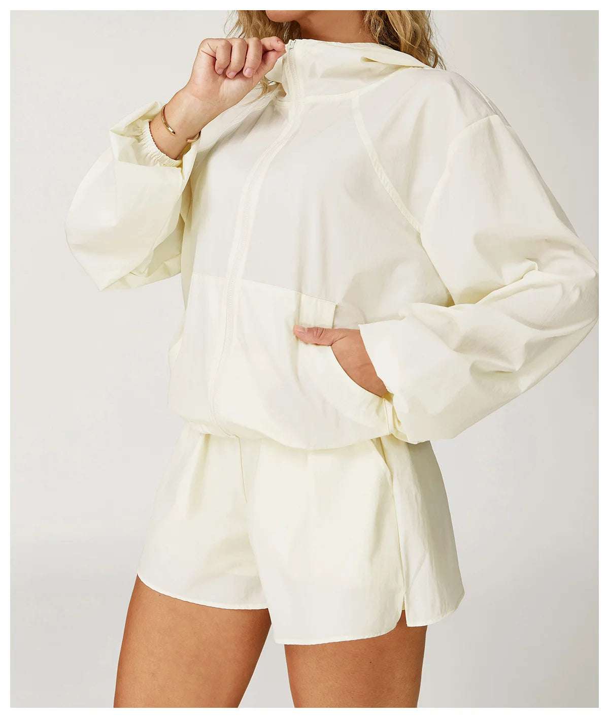 Long sleeved zipper front pocket sports jacket