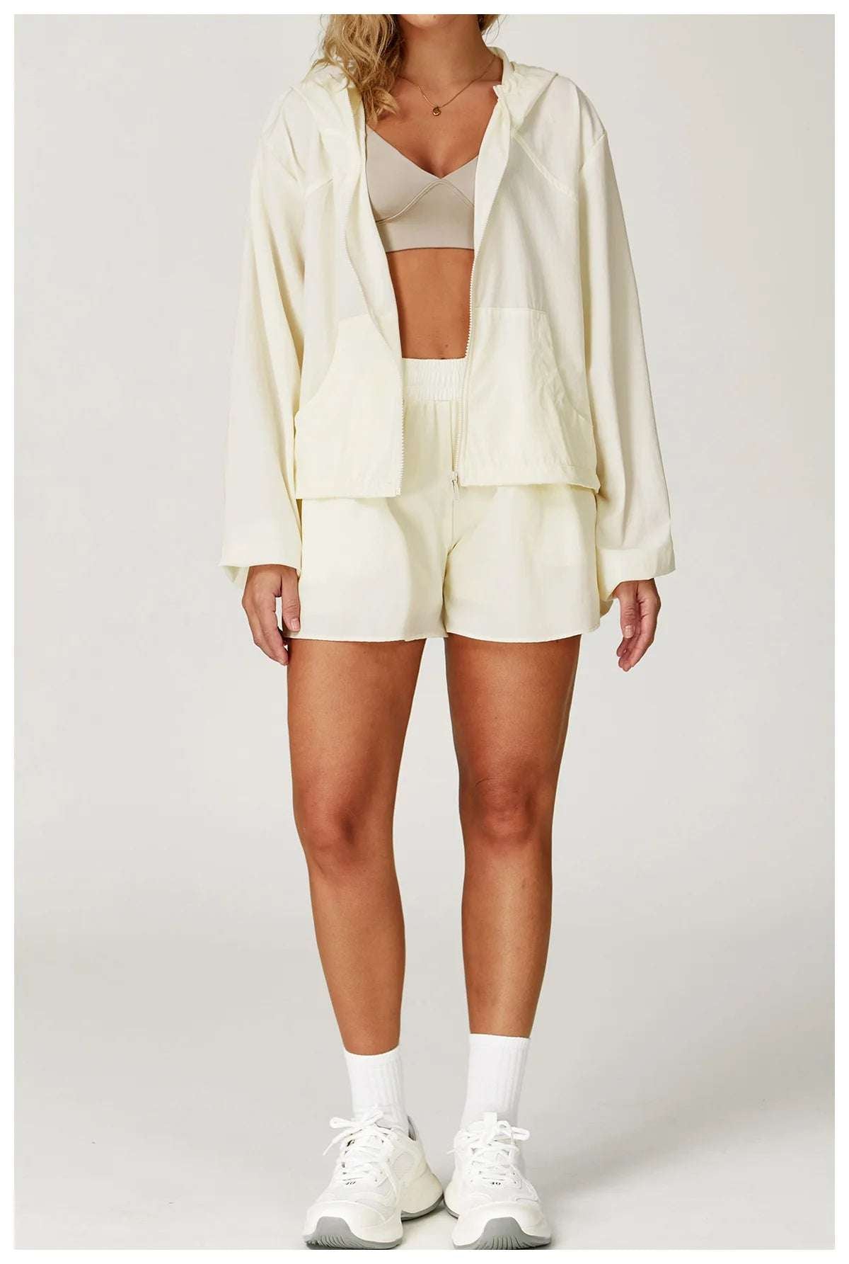 Long sleeved zipper front pocket sports jacket