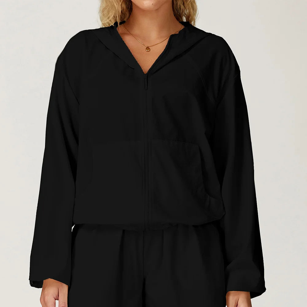 Long sleeved zipper front pocket sports jacket