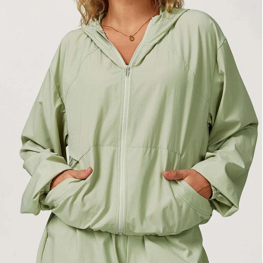 Long sleeved zipper front pocket sports jacket