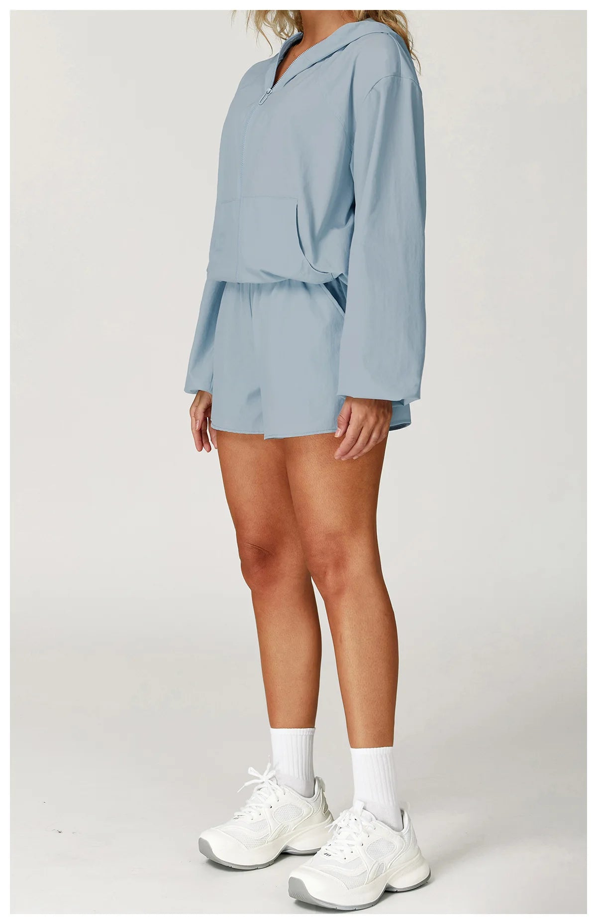 Long sleeved zipper front pocket sports jacket