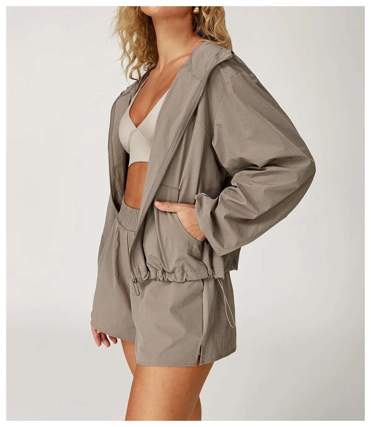 Long sleeved zipper front pocket sports jacket