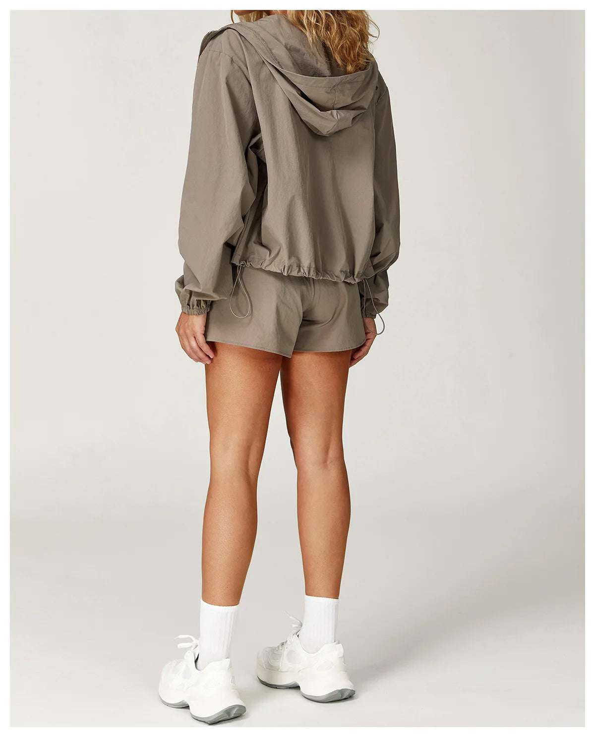 Long sleeved zipper front pocket sports jacket