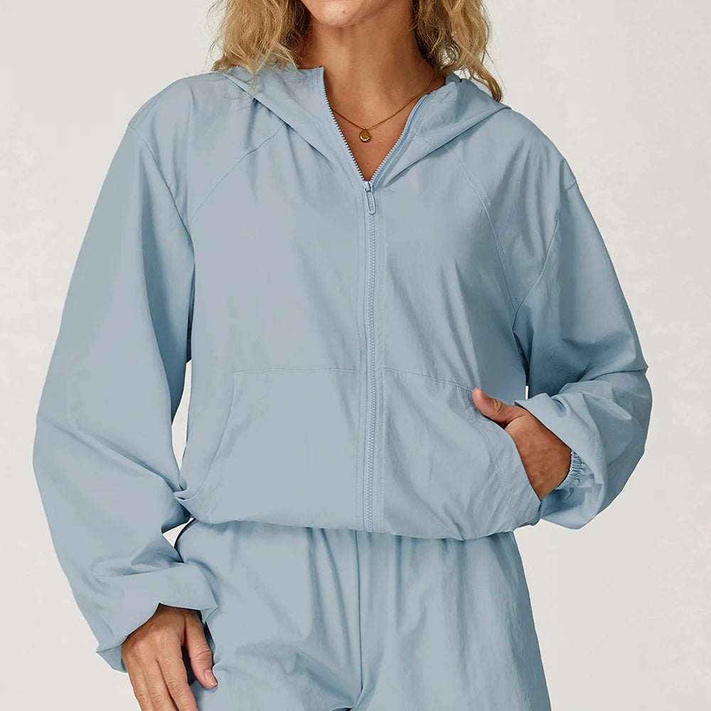 Long sleeved zipper front pocket sports jacket