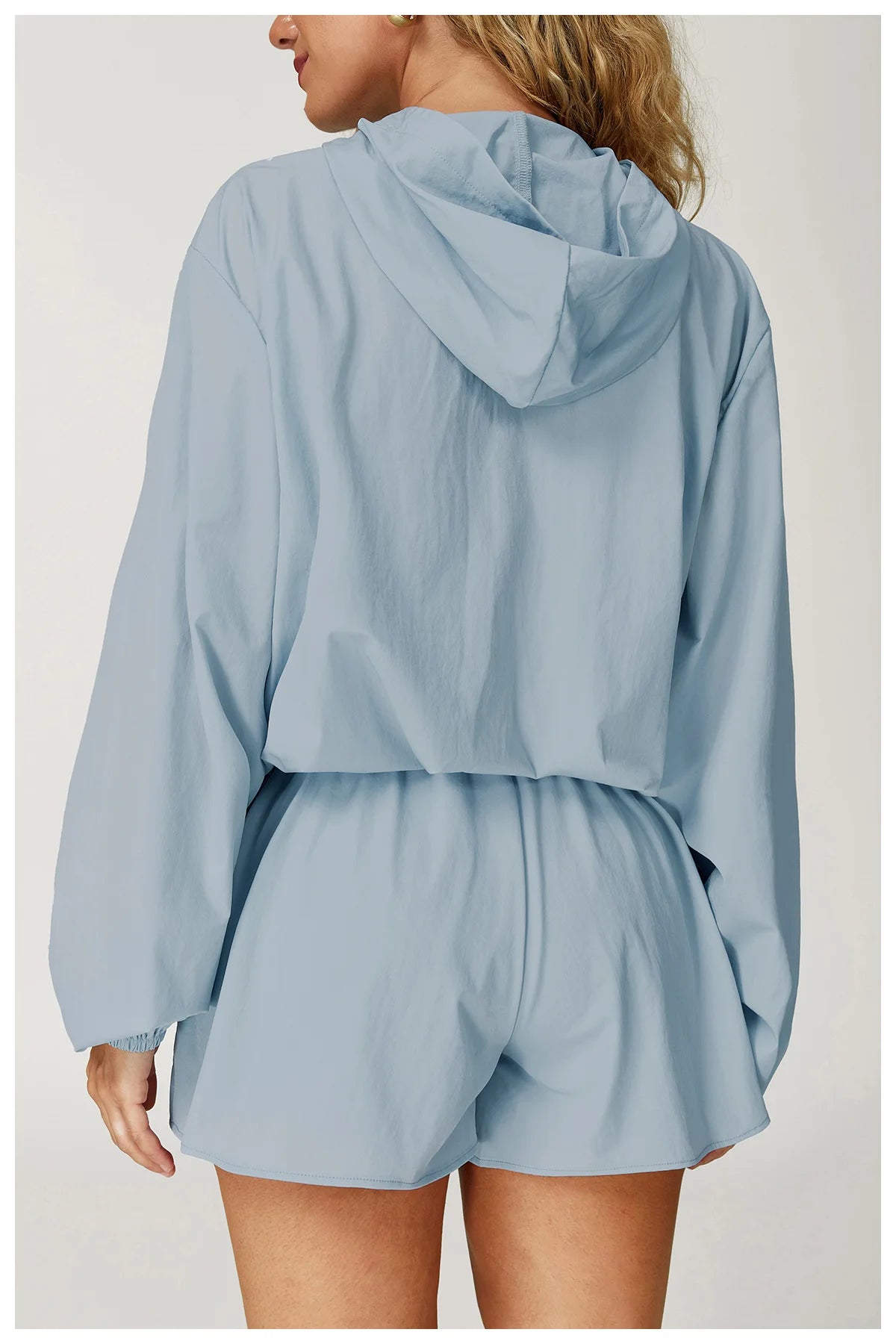 Long sleeved zipper front pocket sports jacket