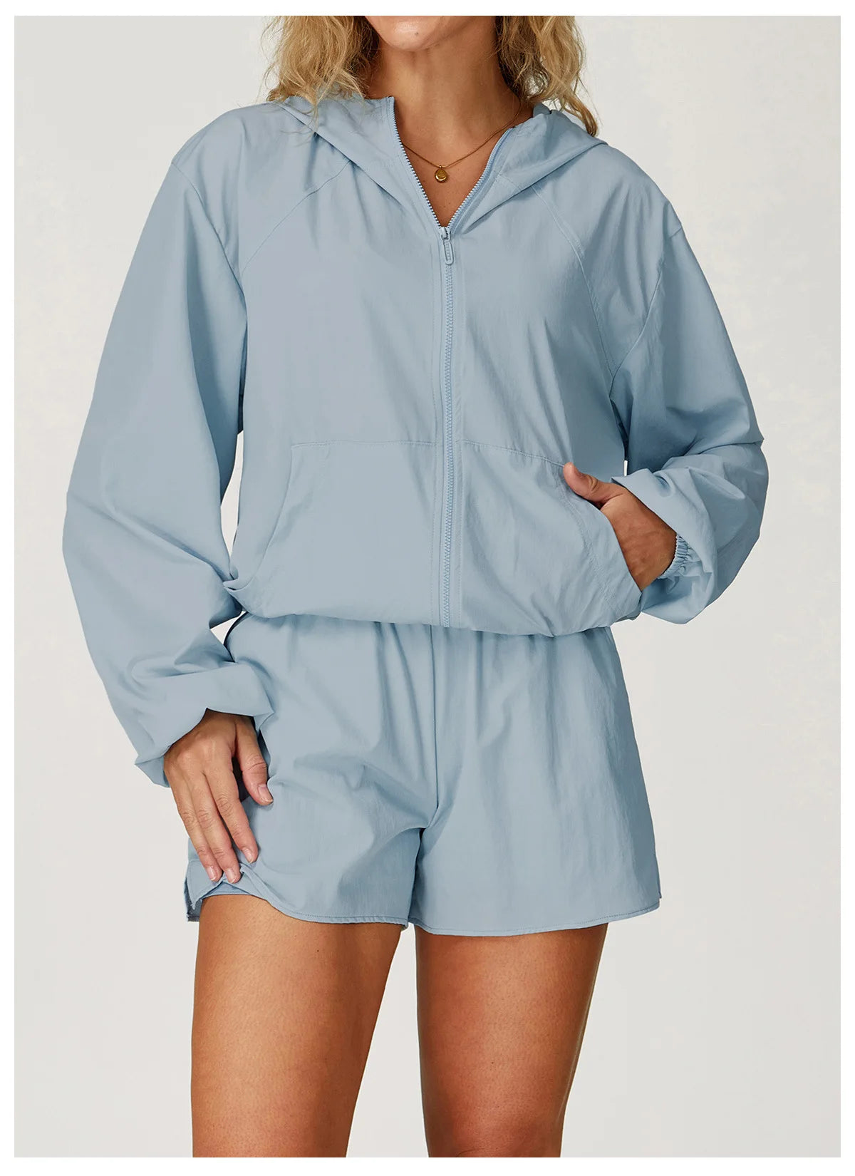 Long sleeved zipper front pocket sports jacket