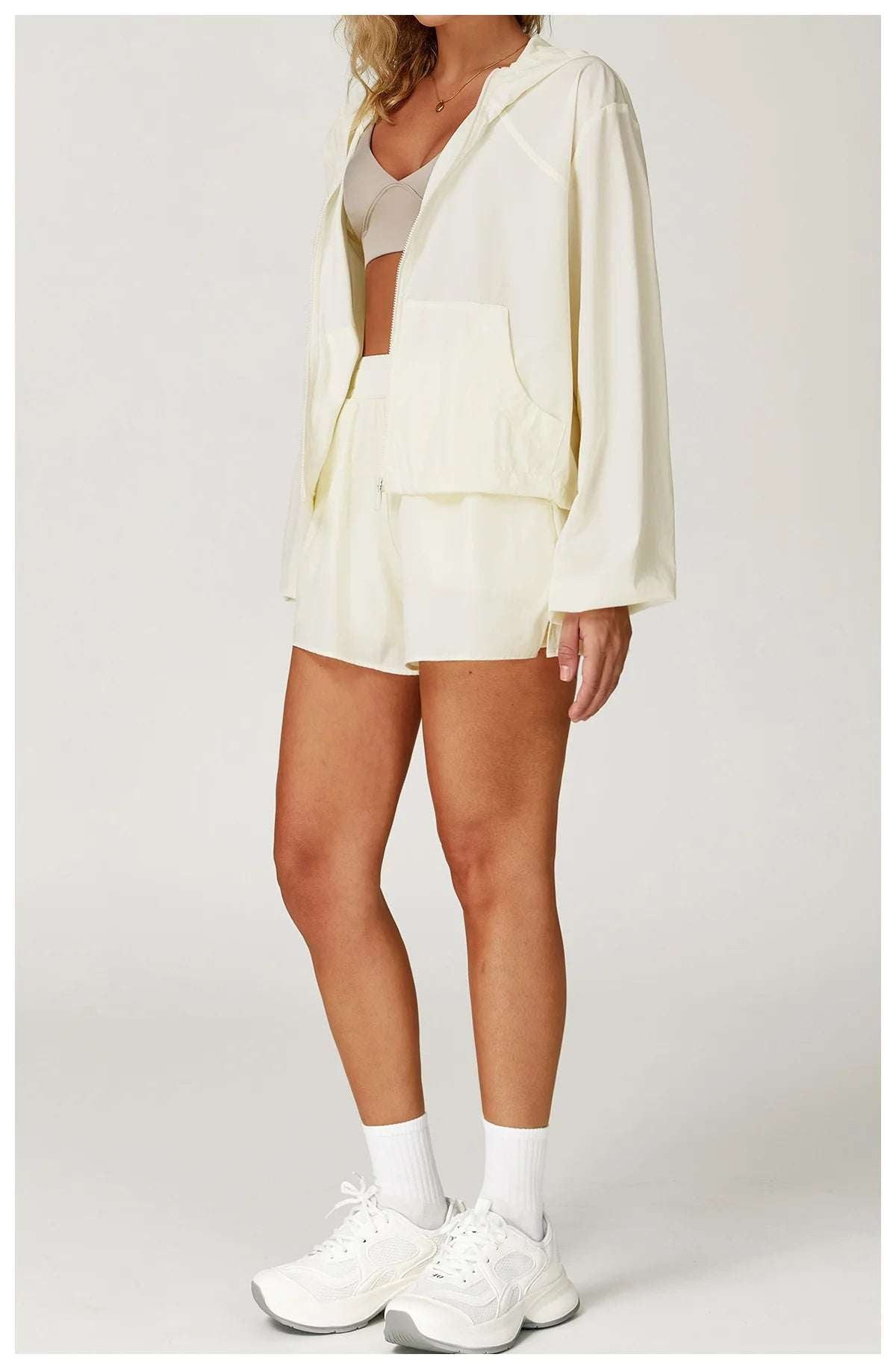 Long sleeved zipper front pocket sports jacket